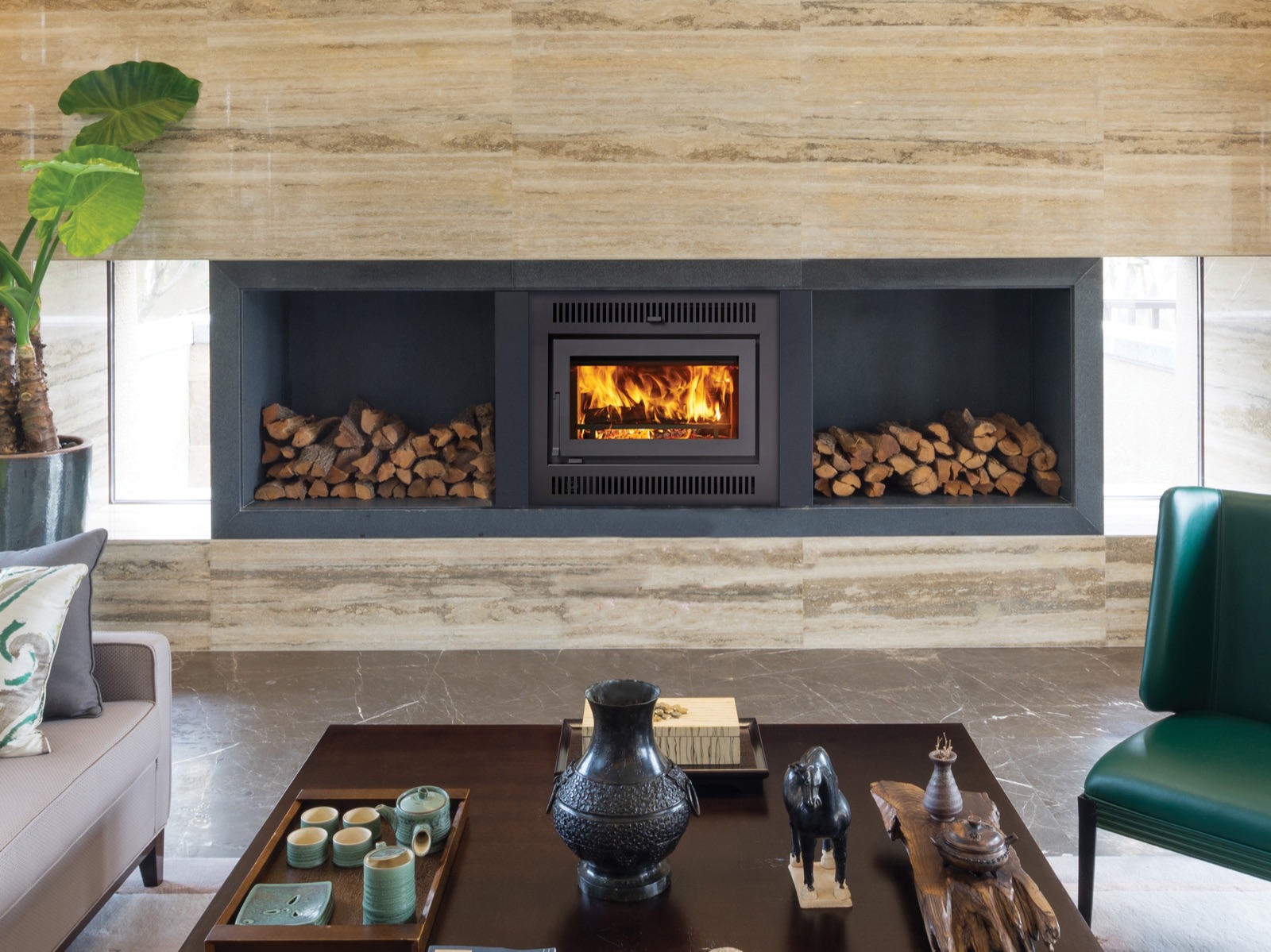 A linear gas fireplace installed in a contemporary living room.